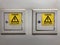 Metal energy boxes. Written in Portuguese: Caution - Risk of shock