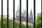 Metal fence with a view of the Cathedral of St. Vitus. Metal fence close up.