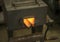 Metal forge heating steel in blacksmith shop
