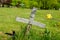 Metal grey cross in a cemetary