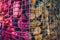 a metal grid behind which there is a large number of cobblestones and stones, closeup of decorations in the city or some