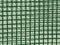 Metal grid and green cement wall texture.