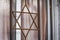 Metal grille in the form of six pointed star of David closeup in Netanya, Israel