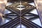 The metal grille in the style of Art Deco on doors of an old house early twentieth century