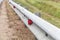 Metal guardrail mounted on a highway roadside