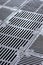 Metal gutter grates and ventilation grids. industrial background