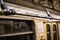 Metal handrails in a subway car with fingerprints. Close-up. Horizontal orientation.