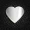 Metal heart on a background mesh of carbohydrate, websites and postcards. For congratulations on Valentine`s day.