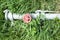 Metal irrigation pipe in a grass field