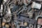 Metal junk background - old bolts screws and small steel tool parts
