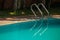 Metal Ladder into Pool from Sidewalk in Palm Shady Place