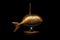 metal liberty style whale lamp isolated on black background illustration generative ai