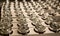 Metal lids of steel color of glass jars for spices arranged in rows. Selective focus. Home inventory, design