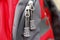 Metal lightning and qualitative clasp, on a camping backpack, red gray color