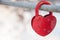 Metal lock symbol of love in the form of a red heart, romance of Valentine`s Day