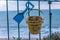 Metal ornament on a balustrade in a seaside village, a symbolic