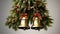 metal Orthodox church bells, a bottom view of the church bells against a background of green pine branches, emphasize