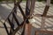 Metal Padlock and Chain attached to Rusty Railings