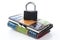 Metal padlock standing on multi-colored leather wallet closeup