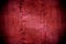 Metal painted crimson wall texture