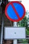 Metal Plate, Traffic Prohibitory Sign: Parking is prohibited, No Parking. The sign, usually shown as a red diagonal bar inside a b