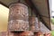 Metal prayer wheels from Buddhism Tibetan monastery of Nepal