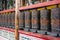 Metal Praying Cylinders In A Buddhist Temple
