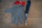 Metal protective glove and kitchen knife on wooden table,for butchers or woodworking