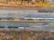 Metal recycling from industrial work drone above view on railway wagon filled with scrap metal