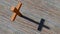 Metal rusted cross on a natural wood or wooden logg background. 3d illustration metaphor for God