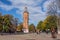 Metal sculpture of violinist and old fire tower in Vinnytsia, Ukraine