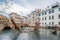 Metal sculptures in water canal of Treviso