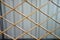 Metal sheet and bamboo lath background