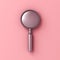 Metal silver magnifying glass isolated on pink pastel color background