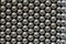 Metal sling balls arranged in rows, balls for bearings