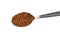 Metal spoon full of freeze dried instant coffee