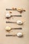 Metal spoons of various gluten free flour almond flour, oatmeal flour, buckwheat flour, rice flour, corn flour , flat