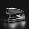 metal stapler on a black background. office supplies