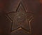 Metal star brown background