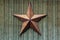 Metal Star On Wood Wall