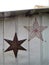 Metal stars on metal farm building