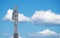 a metal statue against a blue sky with clouds, a monument to the first cosmonaut Yuri Gagarin