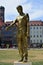 Metal statue to the common caritative helper in MARIENHOF square in Munich, Germany