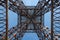 A metal structure tower against the blue sky