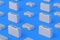 Metal suitcases for money or documents on blue background