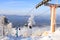 Metal supports for a ski lift at a ski resort, trees in hoarfrost