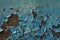 Metal surface covered with old blue paint, background