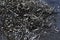 Metal swarf chips scrap cng milling iron close-up