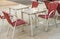 Metal tables and wicker chairs, restaurant front, restaurant gar