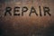 Metal texture and word Repair